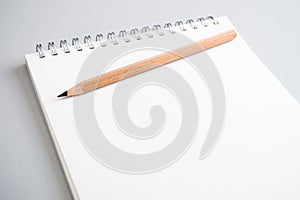 Blank notepad with pencile