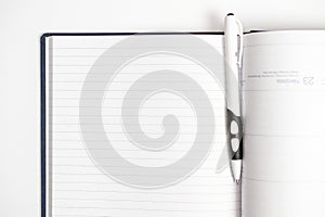 Blank open diary with pen on page, close up view as concept for designers for education, business and other thematic