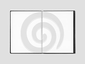 Blank open notebook isolated on grey