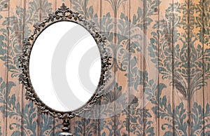 Blank Oval Mirror on vintage wall