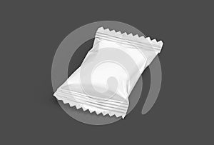 Blank packaging candy palstic sachet isolated on gray photo