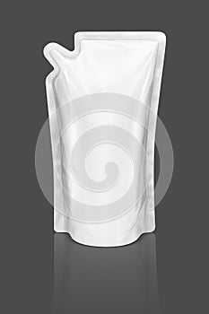 Blank packaging refill pouch isolated on gray background