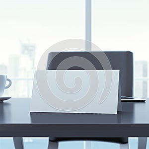 Blank paper card on office table