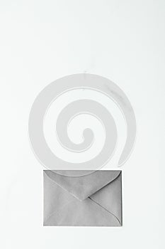 Blank paper envelopes on marble flatlay background, holiday mail letter or post card message design