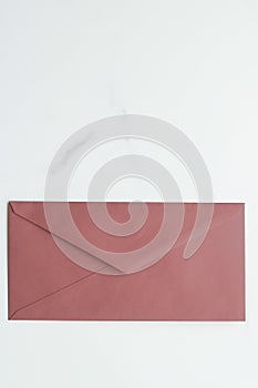 Blank paper envelopes on marble flatlay background, holiday mail letter or post card message design