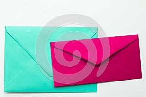 Blank paper envelopes on marble flatlay background, holiday mail letter or post card message design