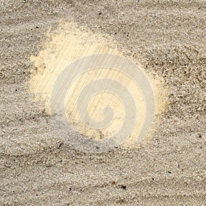 Blank paper note in sand beach texture