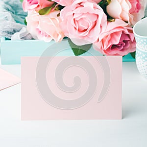 Blank paper pink card Valentine`s day and roses invitation