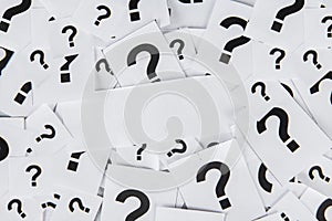 Blank paper with question marks