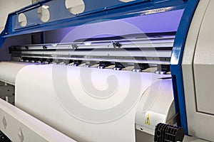 Blank paper roll in large printer format inkjet machine for industrial business