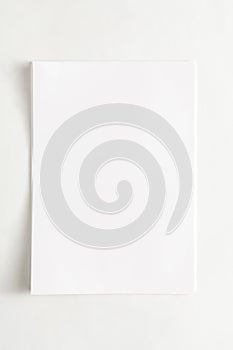 Blank paper sheet attached with clip isolated on white background