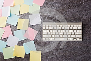 Blank paper stick note list with the modern computer keyboard