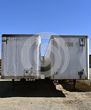 Blank parked van white semi trailer. Perspective frunt