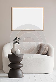 Blank picture frame mockup on gray wall in modern minimal interior design.