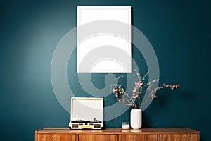 Blank picture frame mockup on green wall. View of modern scandinavian style interior with artwork mock up on wall