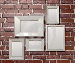 Blank Picture Frames On A Wall Front