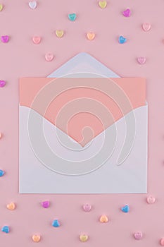 Blank pink card in white envelop