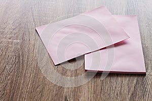 Blank pink envelopes