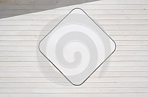 Blank plate mockup on a white wooden wall