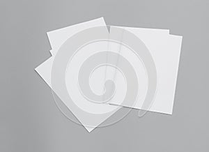 Blank portrait A4. Mock-ups white paper isolated on gray background. can use banners magazine products business texture newspaper.