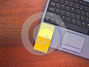 Blank post it notes on laptop