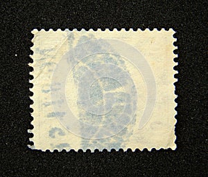 Blank postage stamp with postmark photo
