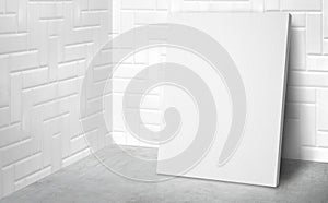 Blank poster at corner studio room with white tile wall and concrete floor background,Mock up studio room for display or montage