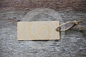 Blank price tag label on wooden