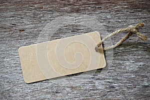 Blank price tag label on wooden