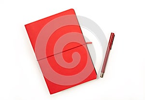 Blank red book and red pen photo