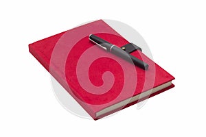 Blank red hardcover notebook with pen