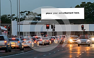 Blank roadside advertising billboard at twighlight