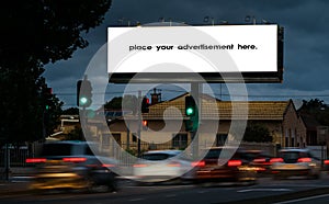 Blank roadside advertising billboard at twighlight photo