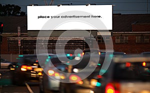 Blank roadside advertising billboard at twighlight photo