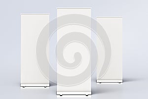 blank roll up banner display stands on white