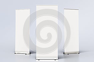 blank roll up banner display stands on white
