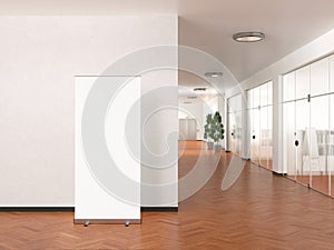 Blank roll up banner stand in modern office