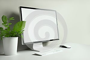 Blank screen desktop computer on a office desk. Generative AI illustration