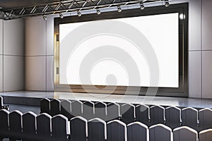 Blank screen in modern conference hall with empty seats. 3D Rendering