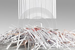 Blank Shredded paper above Cut up credit cards with Shredded Bills and Bank Statements