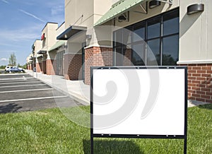 Blank Sign In Front of New Retail Strip Center