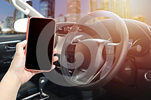 Blank smartphone screen on hand of man