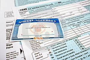 Blank social security card, and 1040 us individual tax income return