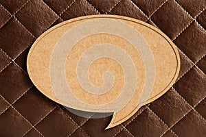 Blank Speech Bubble on Brown leather