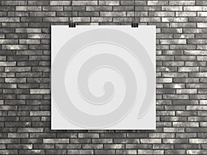 Blank squared poster hanging with clips on a brick wall Mockup. 3D rendering