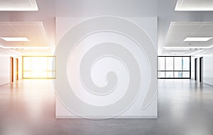 Blank squared wall in office mockup with large windows and sun passing through 3D rendering