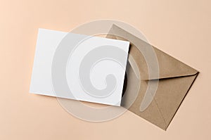 Blank stationery card mockup with craft envelope