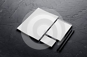 Blank stationery on elegant dark grey concrete texture. Corporate identity template. Mock up for branding, graphic designers prese