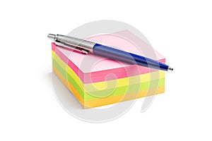 Blank sticky paper notepad and pen