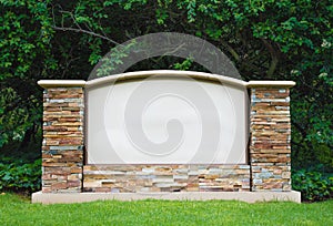 Blank stone sign marker outside